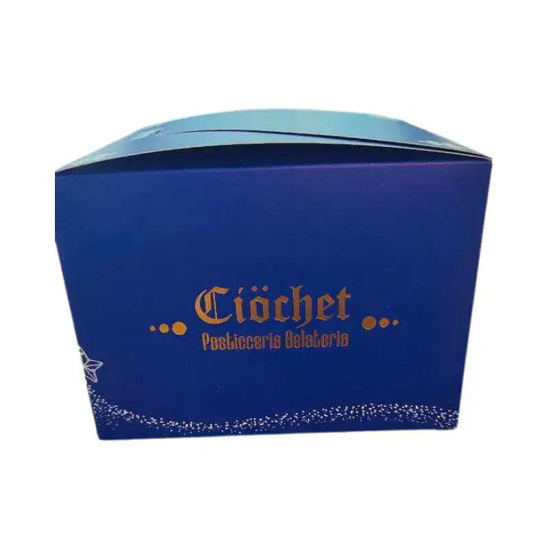 Lato frontale della confezione blu natalizia Ciòchet utilizzata per il panettone artigianale.