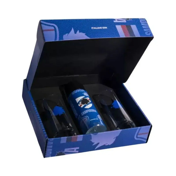 Box regalo Sampdoria aperta con bottiglia di gin artigianale italiano e due bicchieri in vetro con logo blucerchiato all’interno della confezione ufficiale.